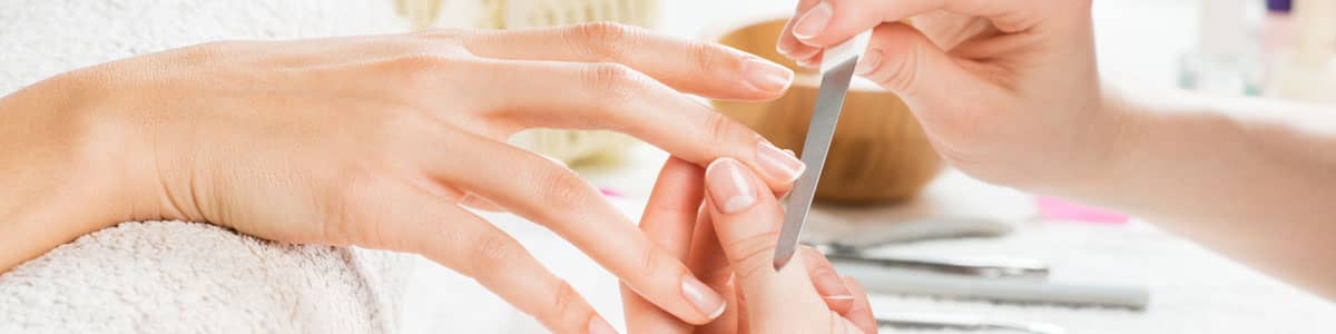 Lady having manicure in Wrexham