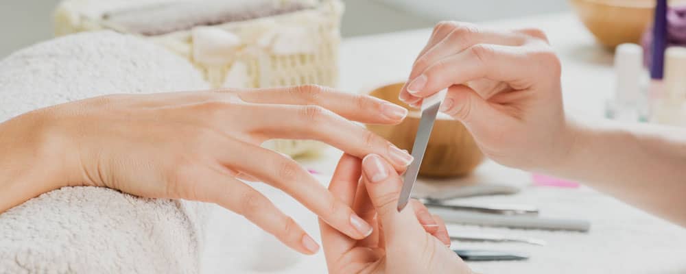 Lady having manicure in Wrexham